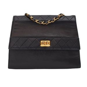 CHANEL VINTAGE LAMBSKIN BLACK TRAPEZOID FLAP BAG MEDIUM (CIRCA 1990)